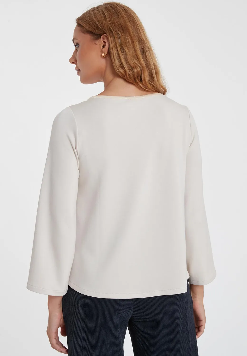 Ana Alcazar Serina top jersey avorio maniche tromba