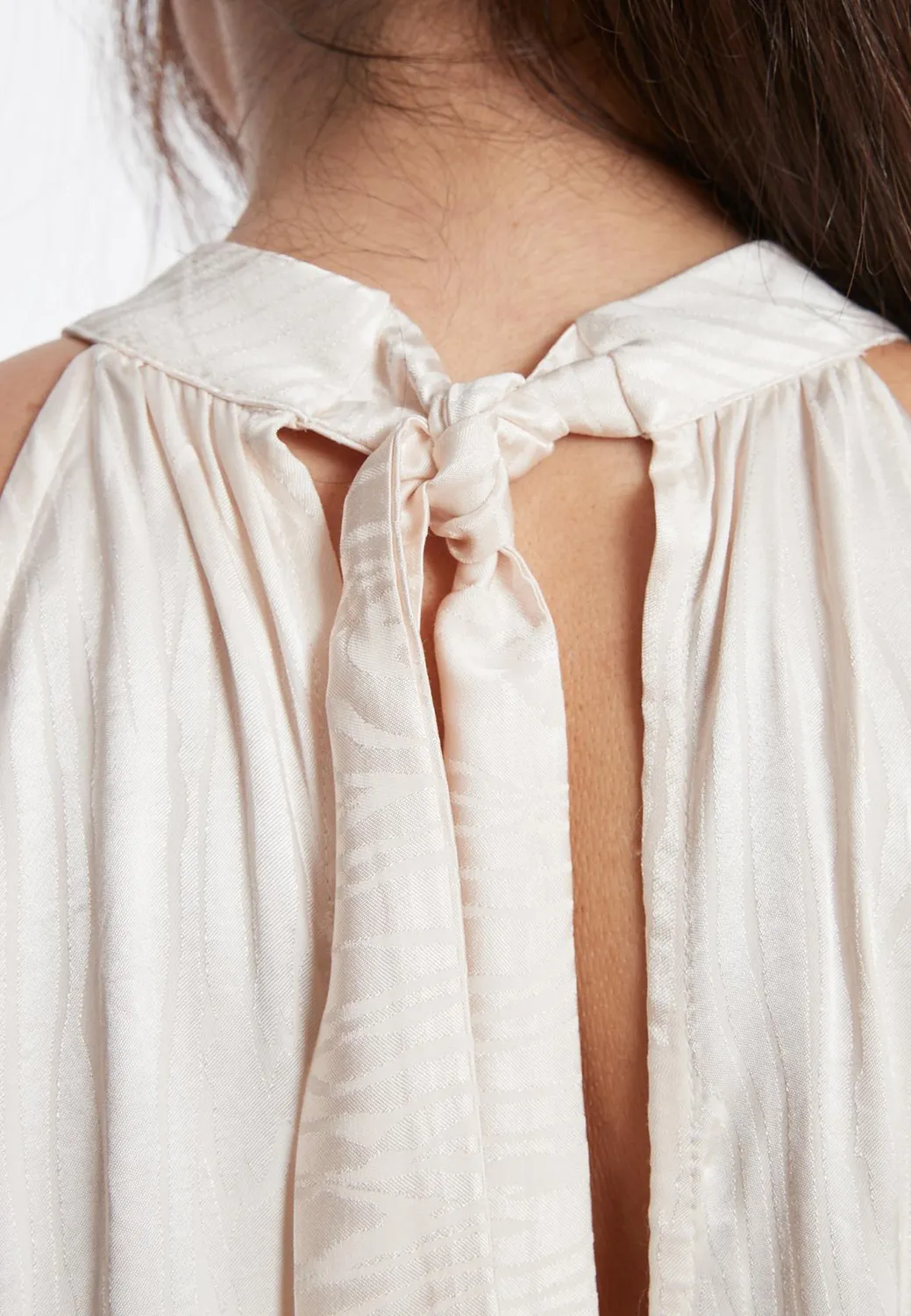 Ana Alcazar Zarla top raso avorio con fiore