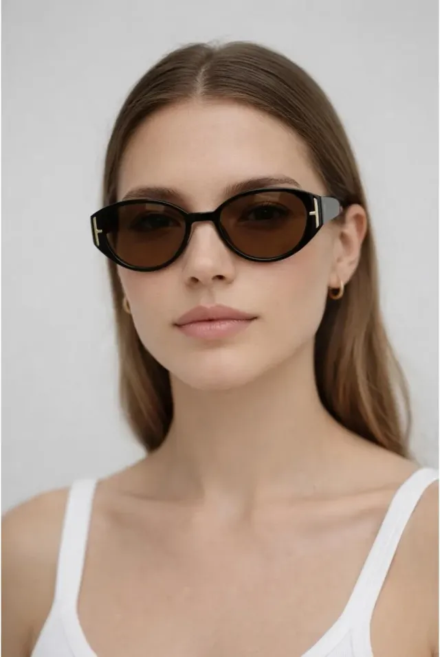 SVNX SG2600102 occhiali sole neri cat-eye